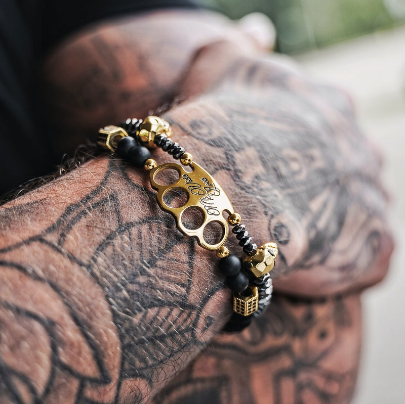 Bracciale MVL "Polygonal skulls" nero/oro